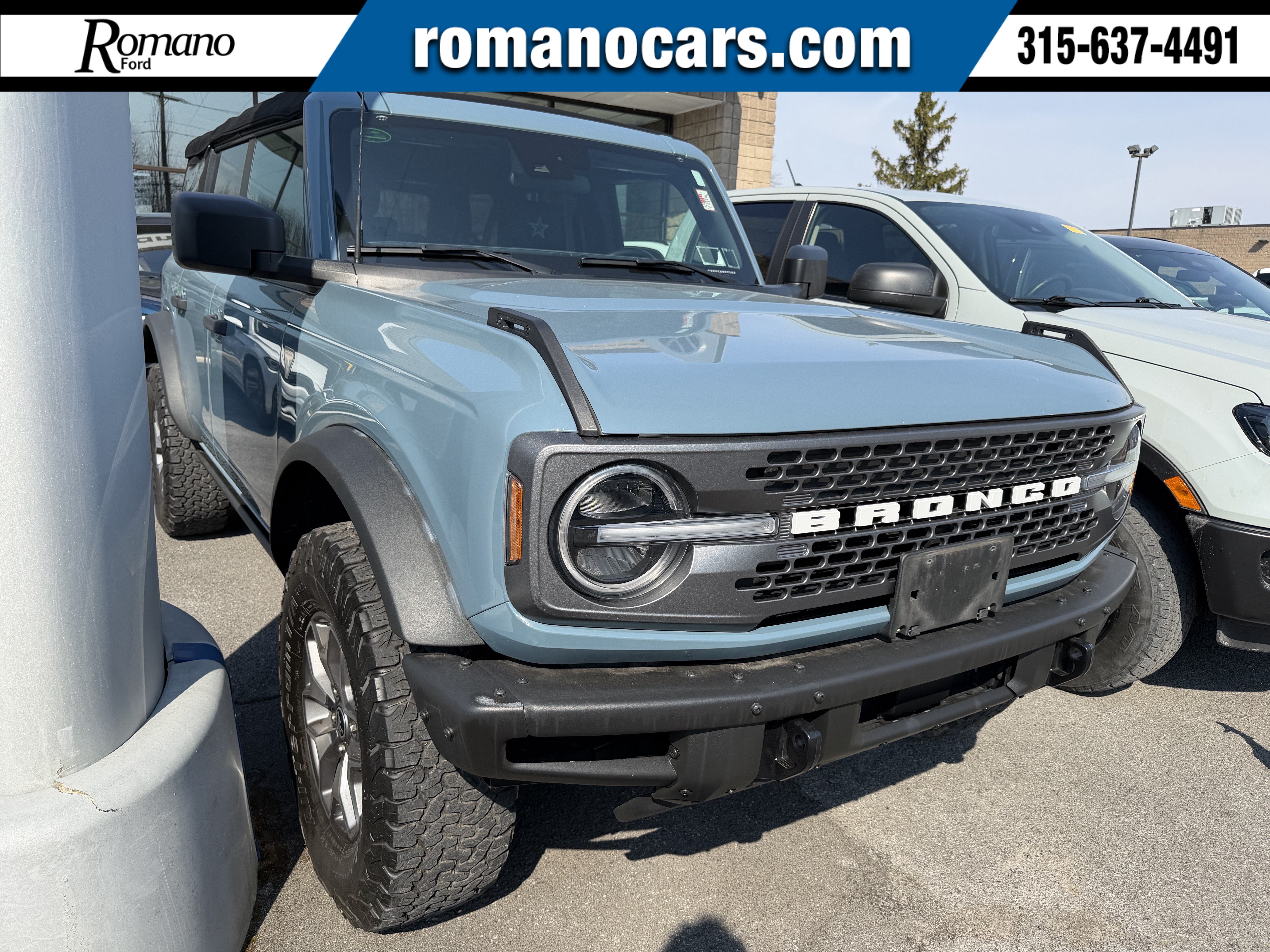 2023 Ford Bronco Badlands in Vapor Blue Metallic — front three-quarter view