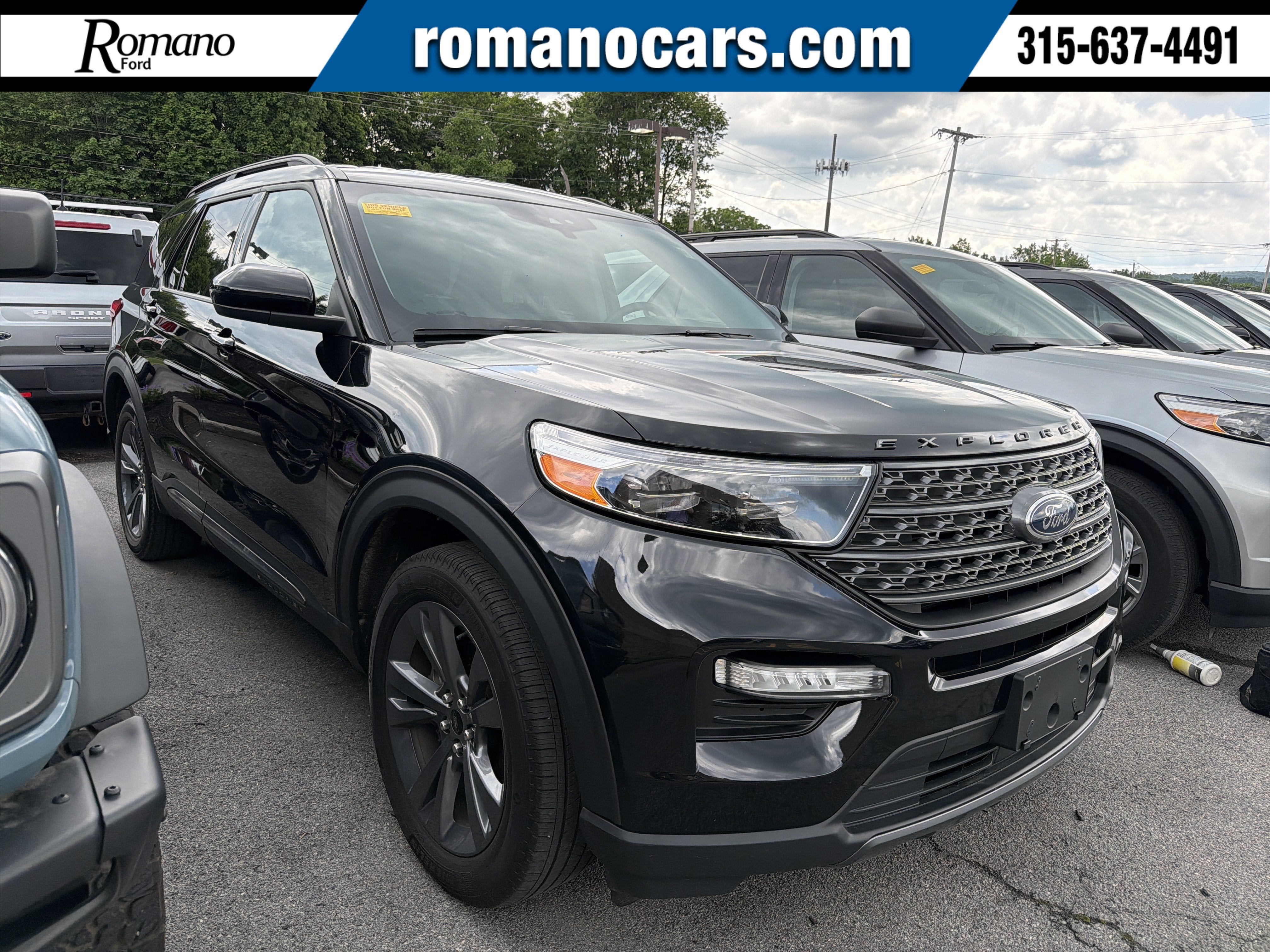 2023 Ford Explorer XLT in Black — front three-quarter view