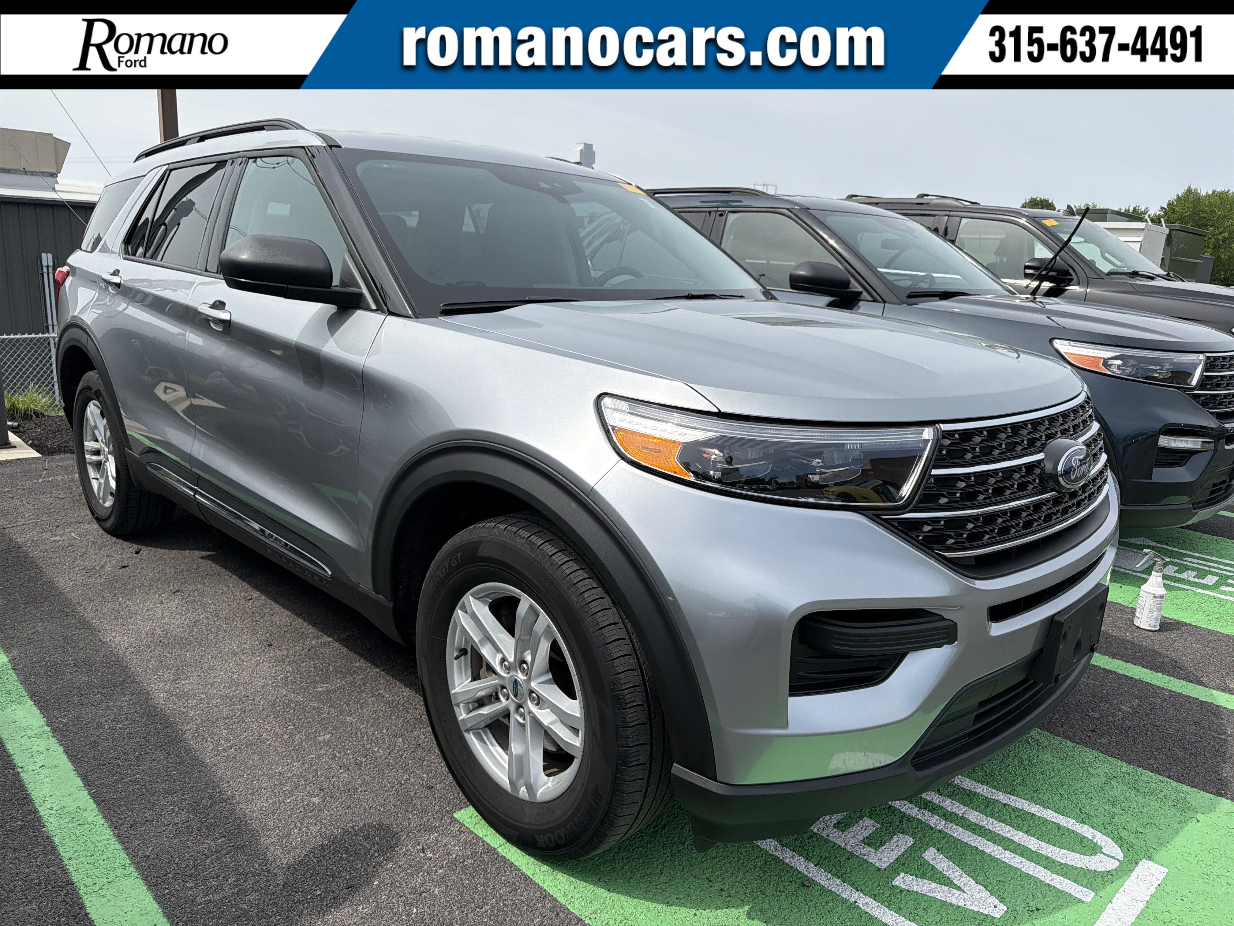 2023 Ford Explorer XLT in Iconic Silver Metallic — front three-quarter view
