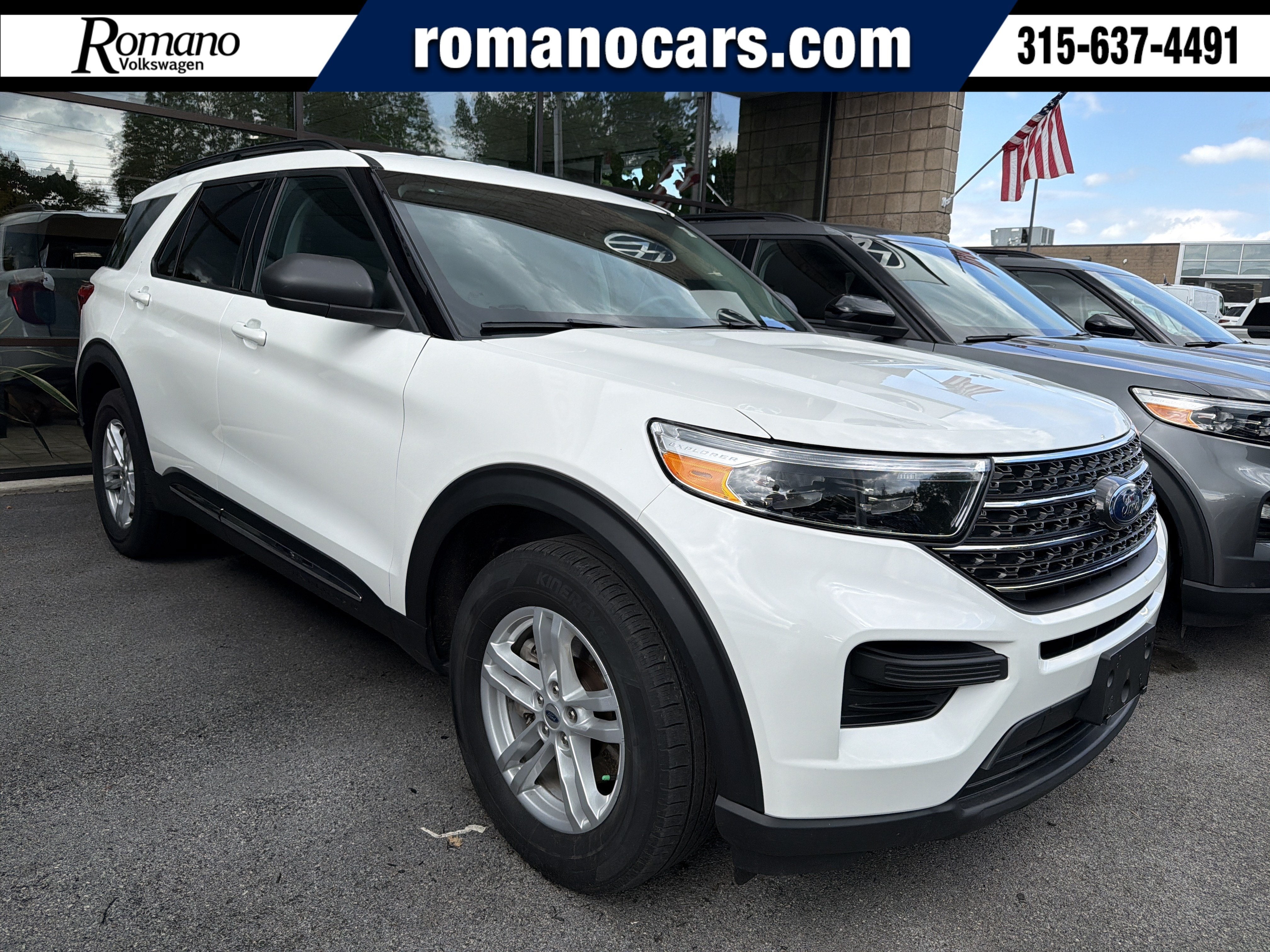 2023 Ford Explorer XLT in White — front three-quarter view