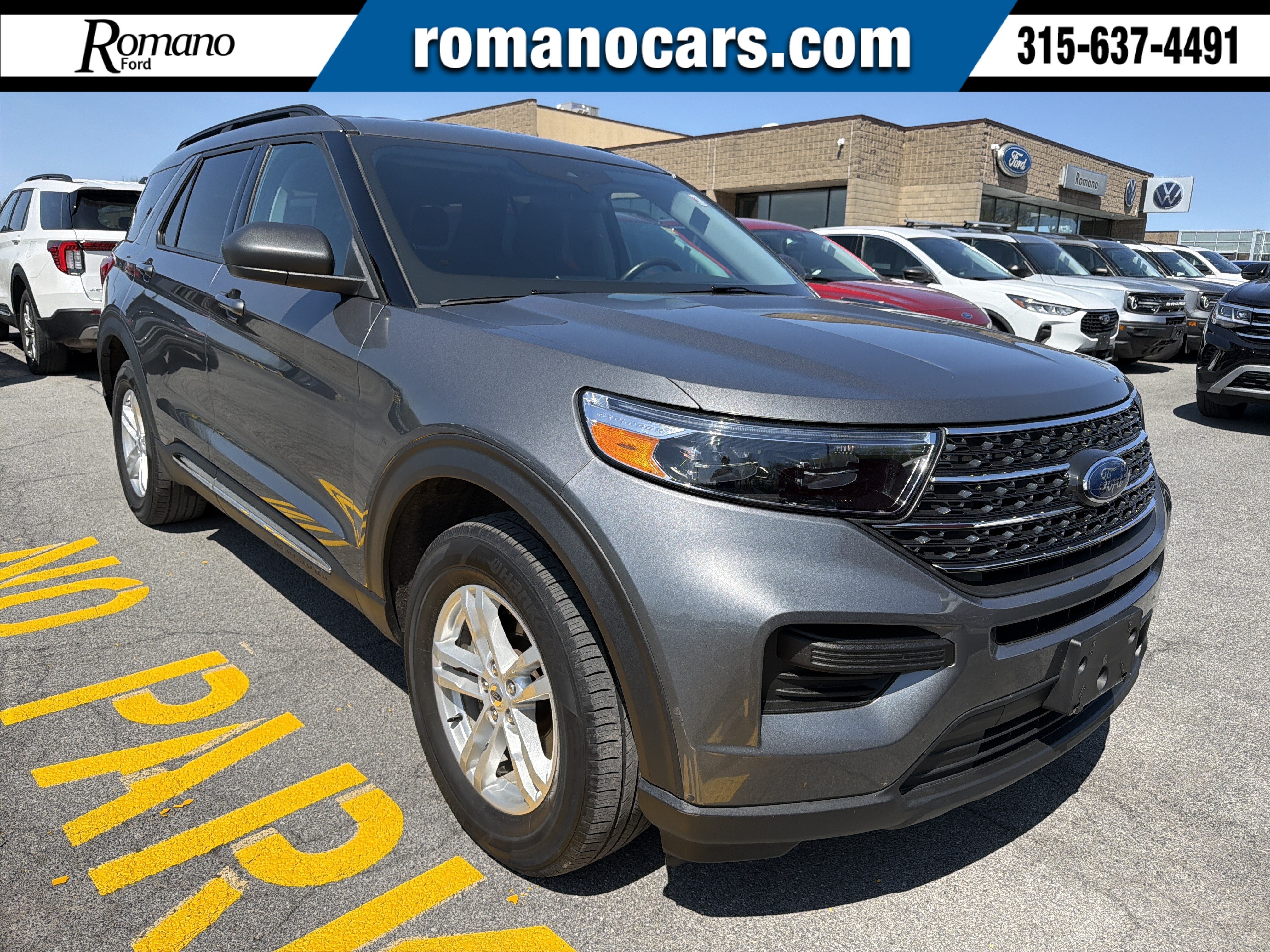 2023 Ford Explorer XLT in Carbonized Gray Metallic — front three-quarter view