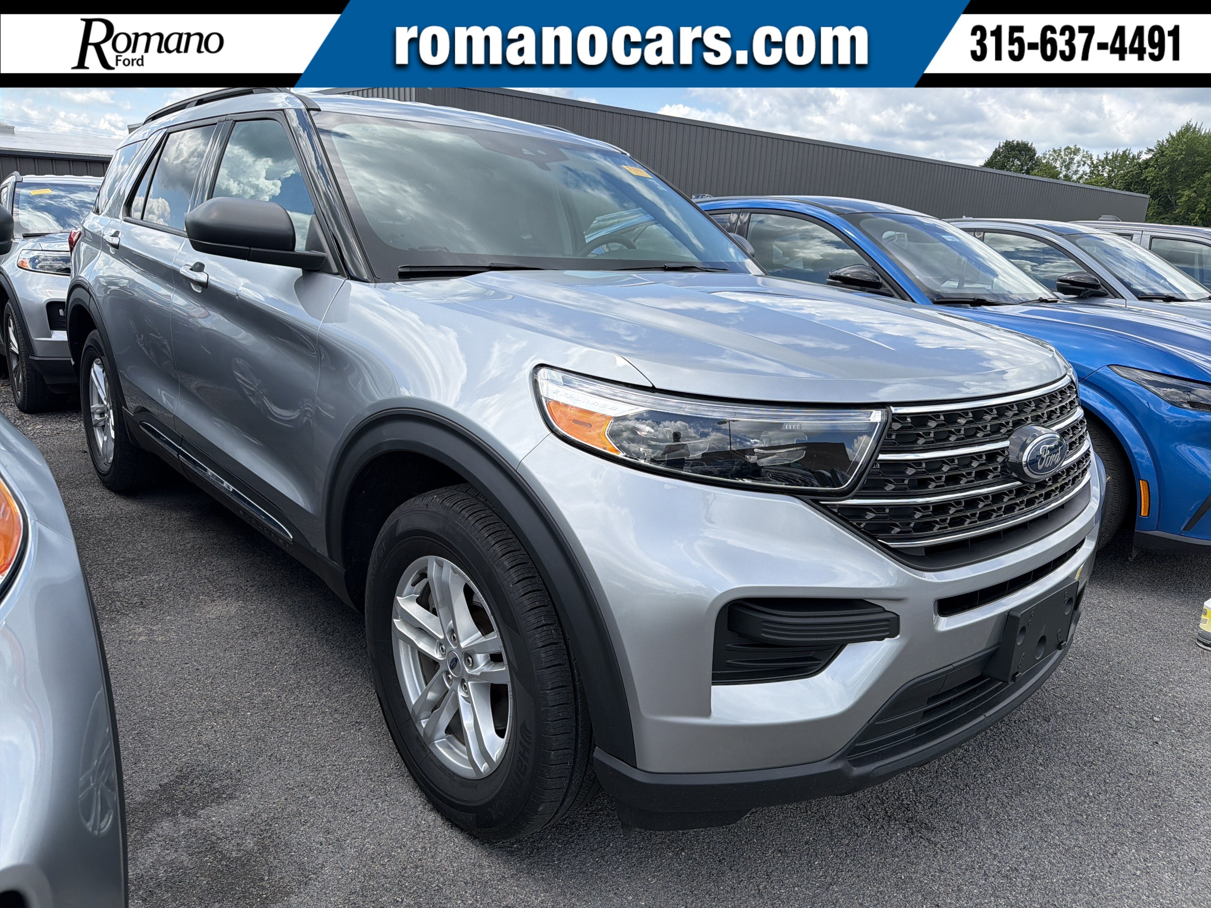 2023 Ford Explorer XLT in Iconic Silver Metallic — front three-quarter view