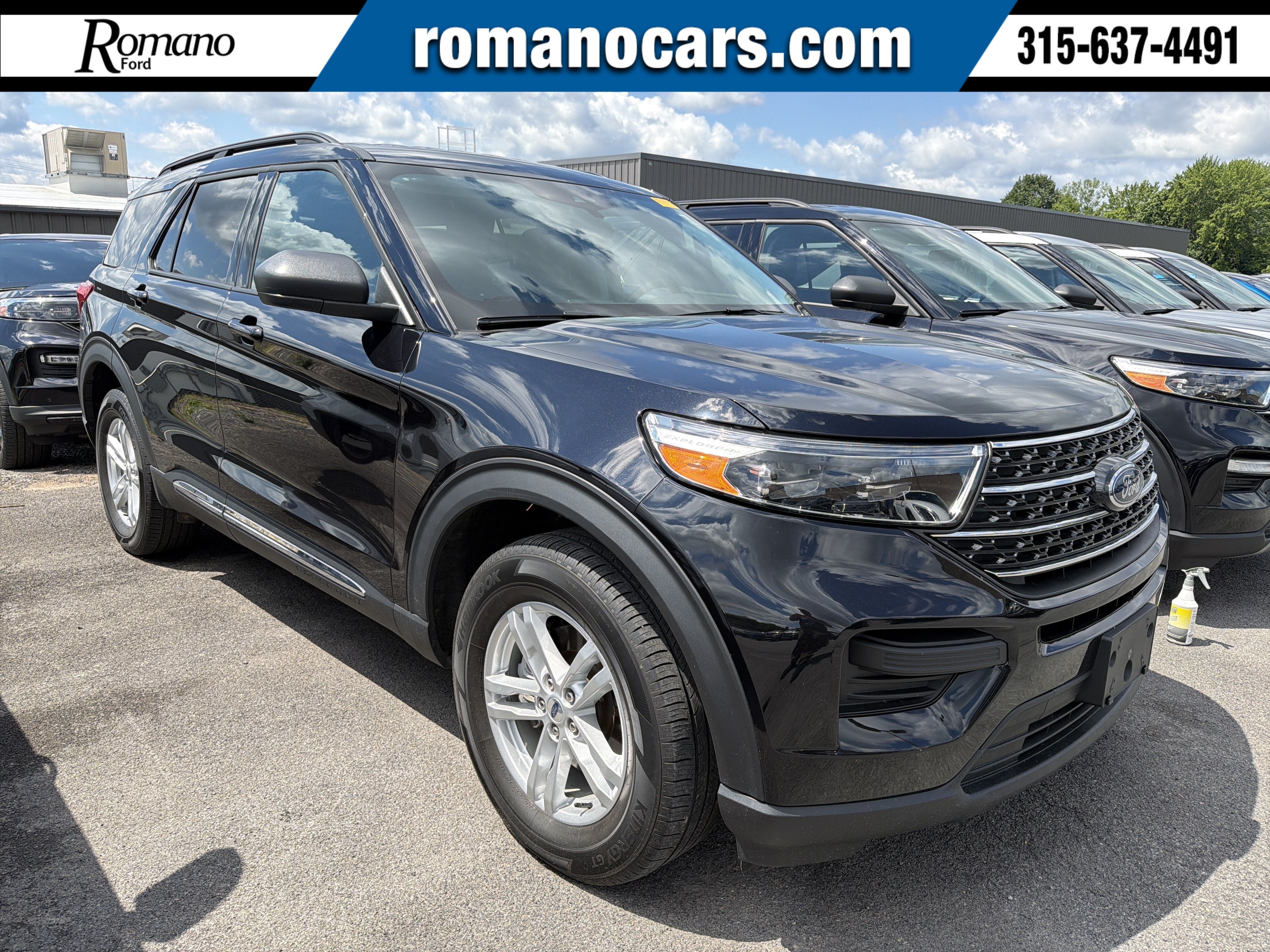 2023 Ford Explorer XLT in Agate Black Metallic — front three-quarter view