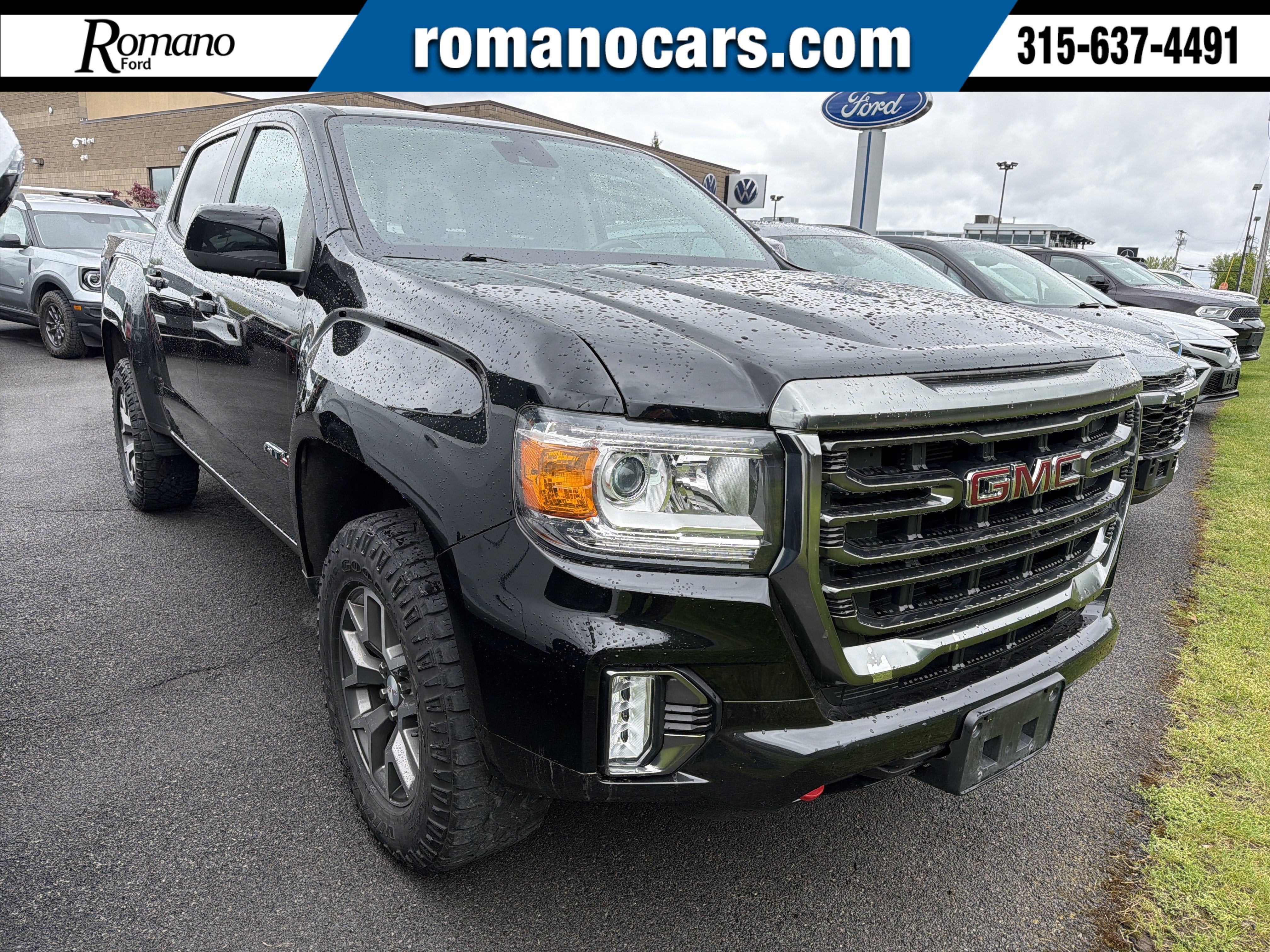 2021 GMC Canyon 4WD AT4 w/Leather in Onyx Black — front three-quarter view