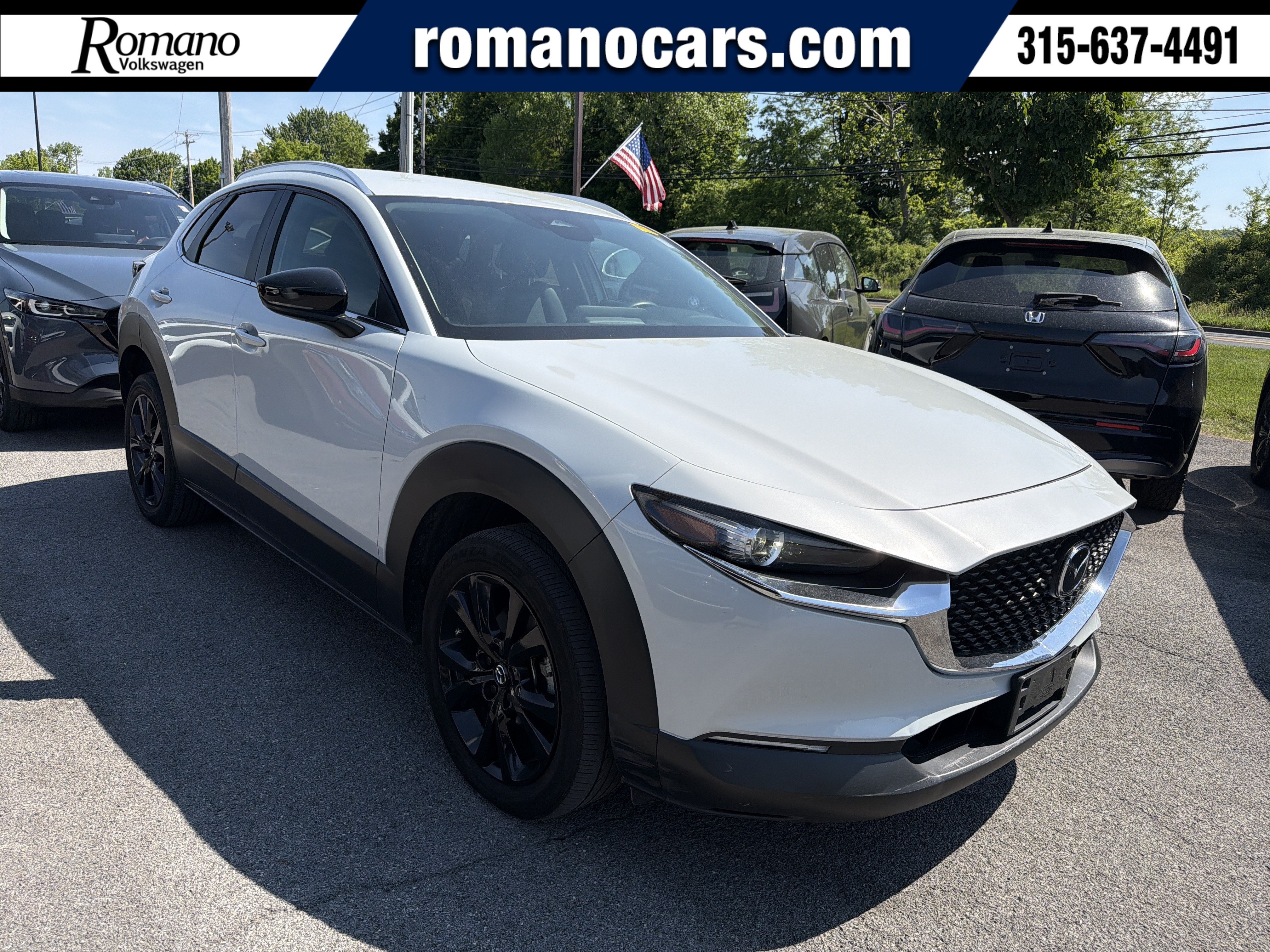 2024 Mazda Mazda CX-30 2.5 S Select Sport in Ceramic Metallic — front three-quarter view