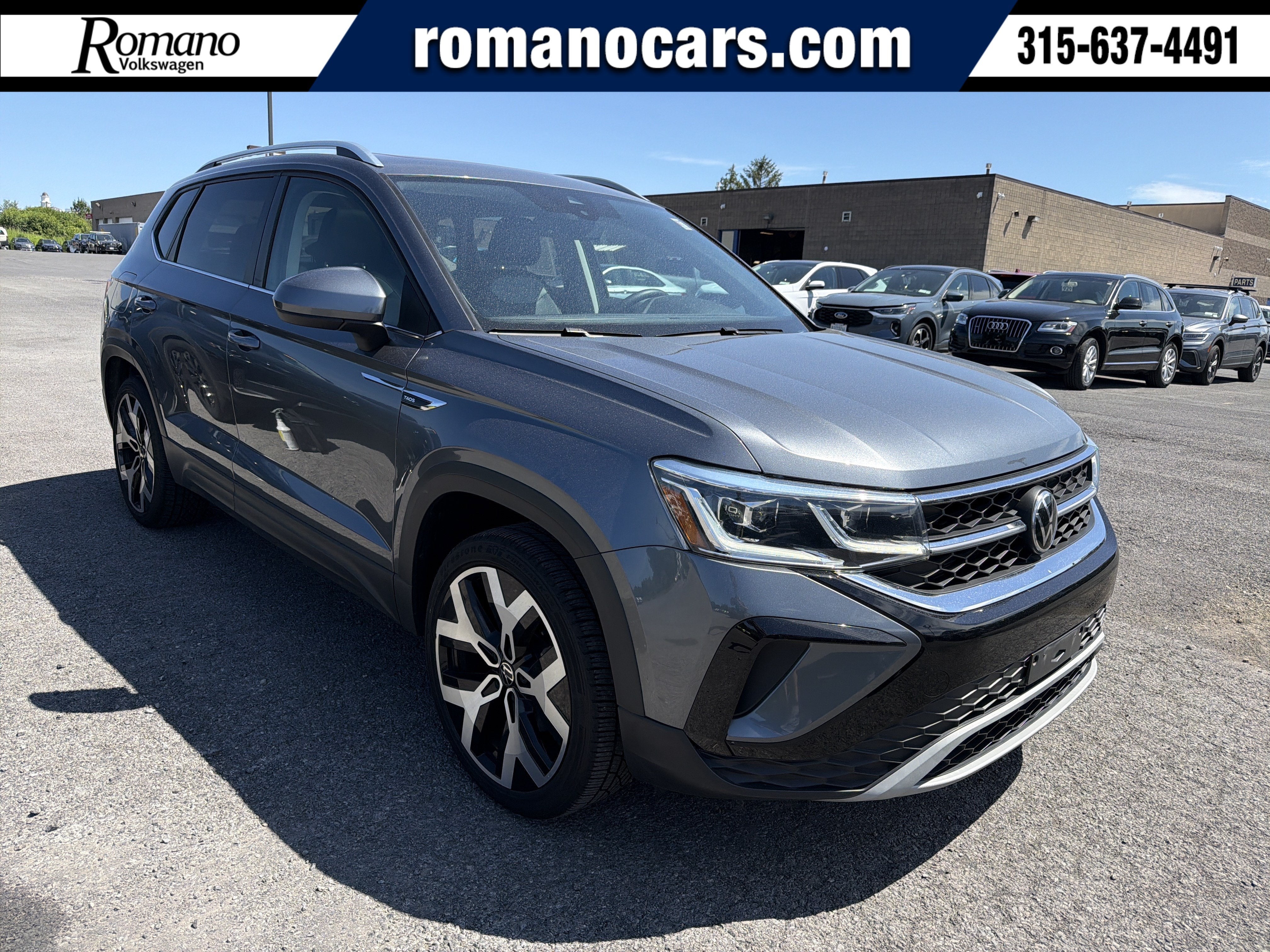 2022 Volkswagen Taos SEL 4MOTION in Pure Gray — front three-quarter view