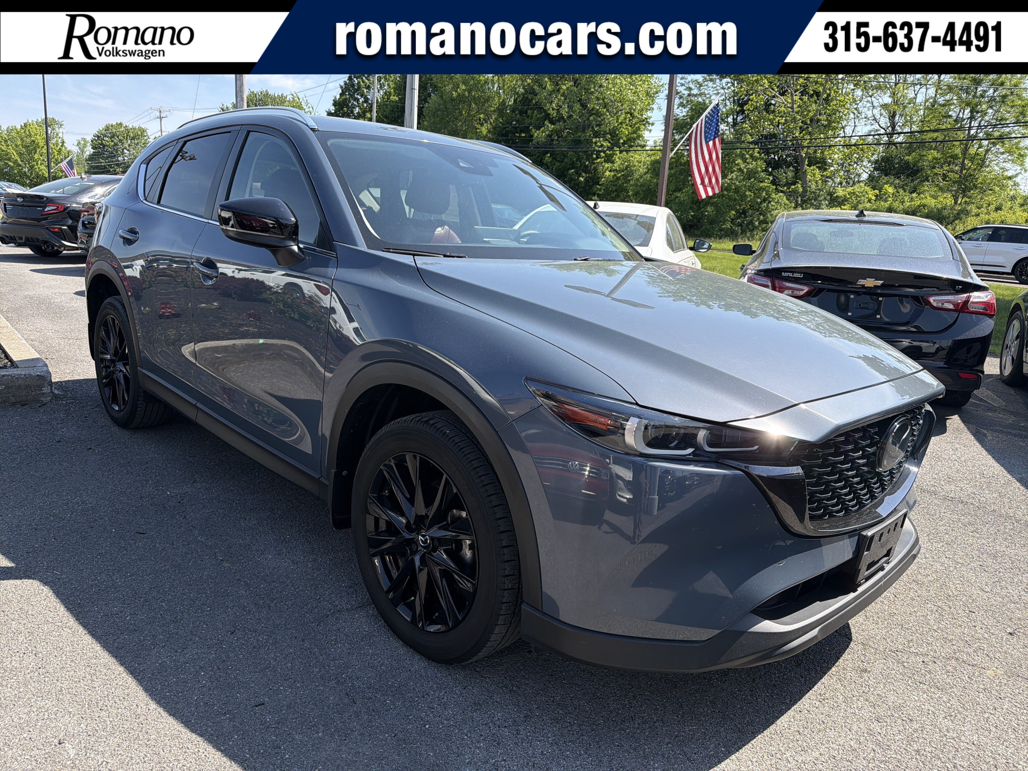 2024 Mazda Mazda CX-5 2.5 S Carbon Edition in Polymetal Gray Metallic — front three-quarter view
