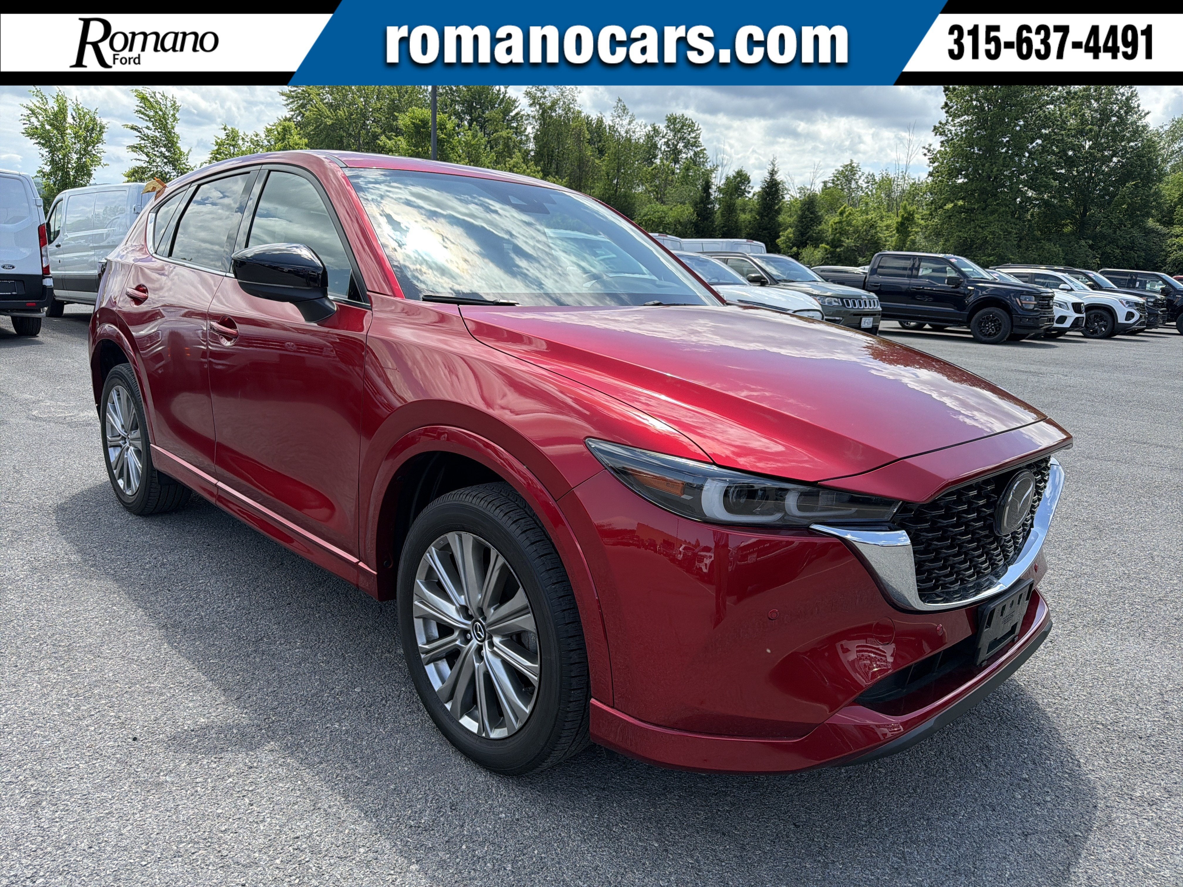 2023 Mazda Mazda CX-5 2.5 Turbo Signature in Soul Red Crystal Metallic — front three-quarter view